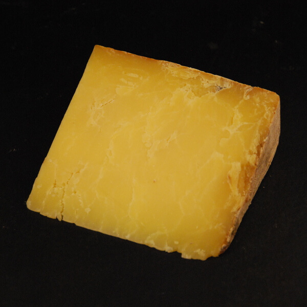 Cheddar : Fromage au lait cru de Vache à pâte pressée non cuite