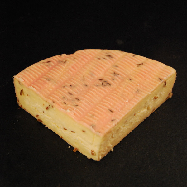 Munster au Cumin : Fromage à base de lait cru de vache